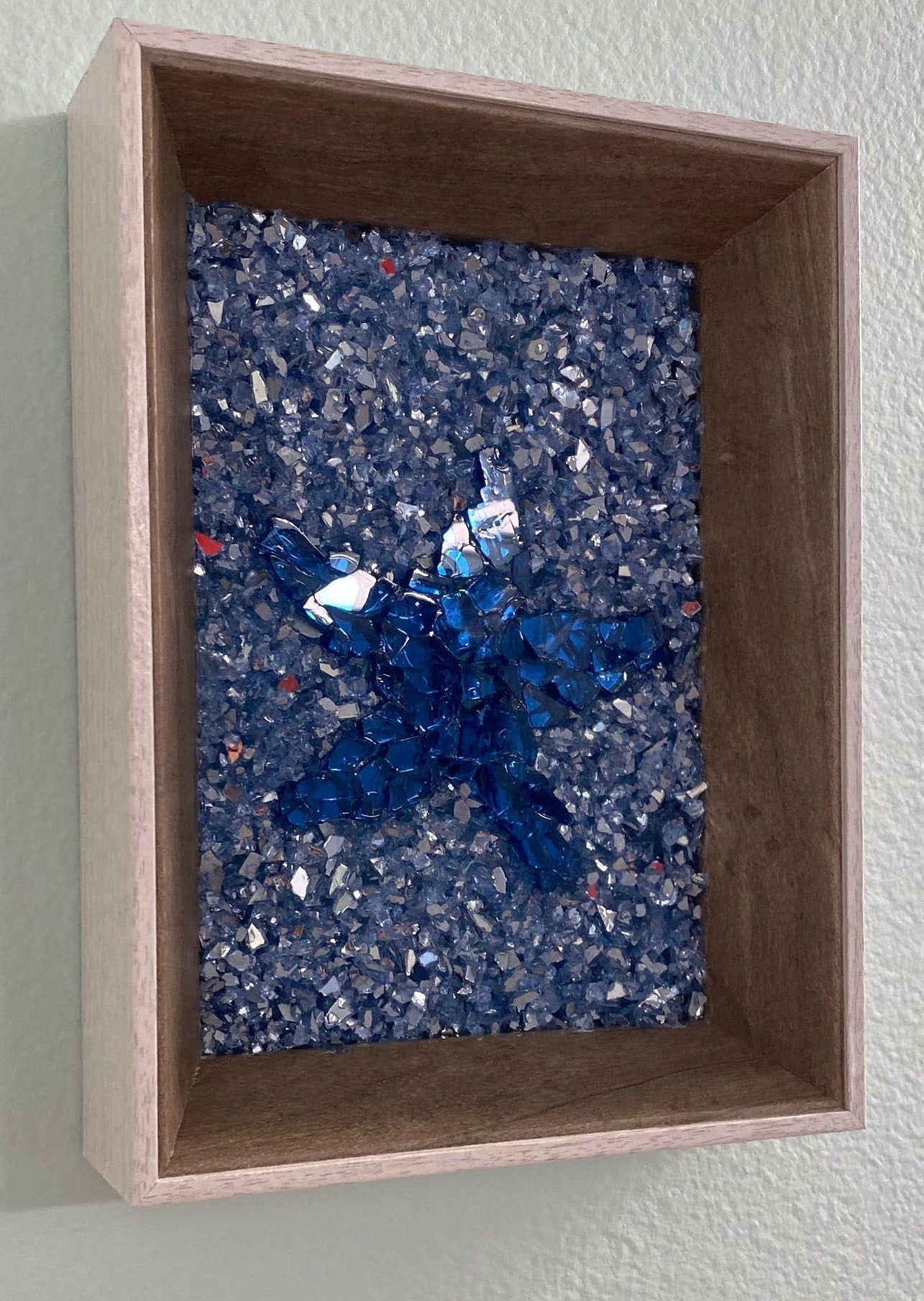 Brown and white framed fire glass and crushed ice sea star starfish