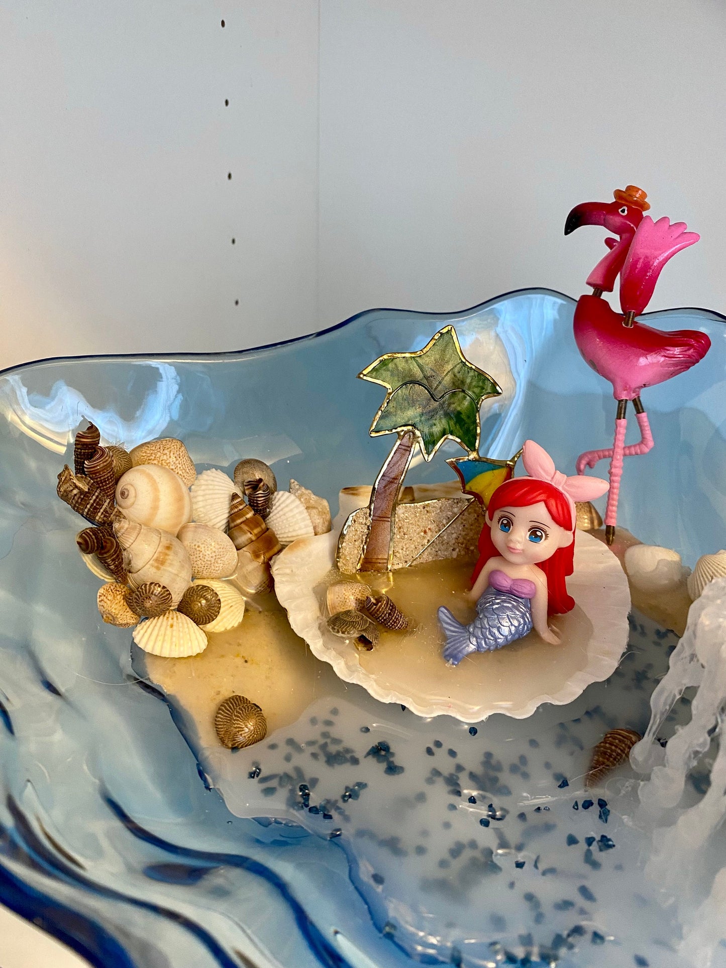Blue acrylic ocean and beach scene with mermaid sand flamingo with waterfall