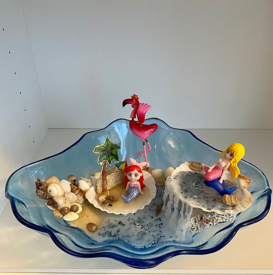 Blue acrylic ocean and beach scene with mermaid sand flamingo with waterfall